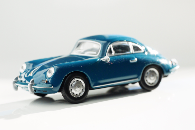 Illustration for article titled Kyosho Porsche 1 1/64 #84 - Projekt RennSport Käfer #2 - 1965 Porsche 356 C Coupe